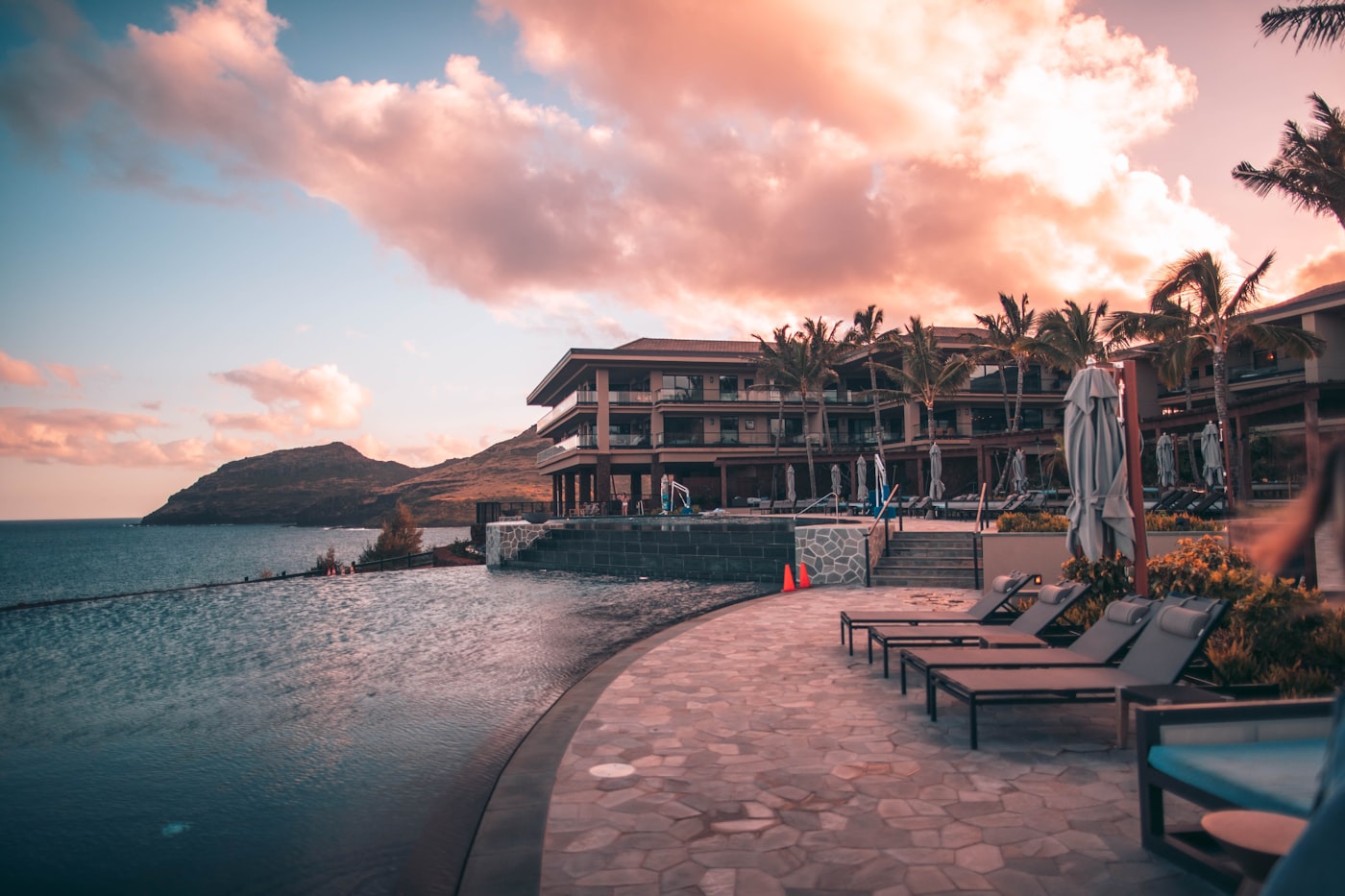 Resort pool deck at sunset