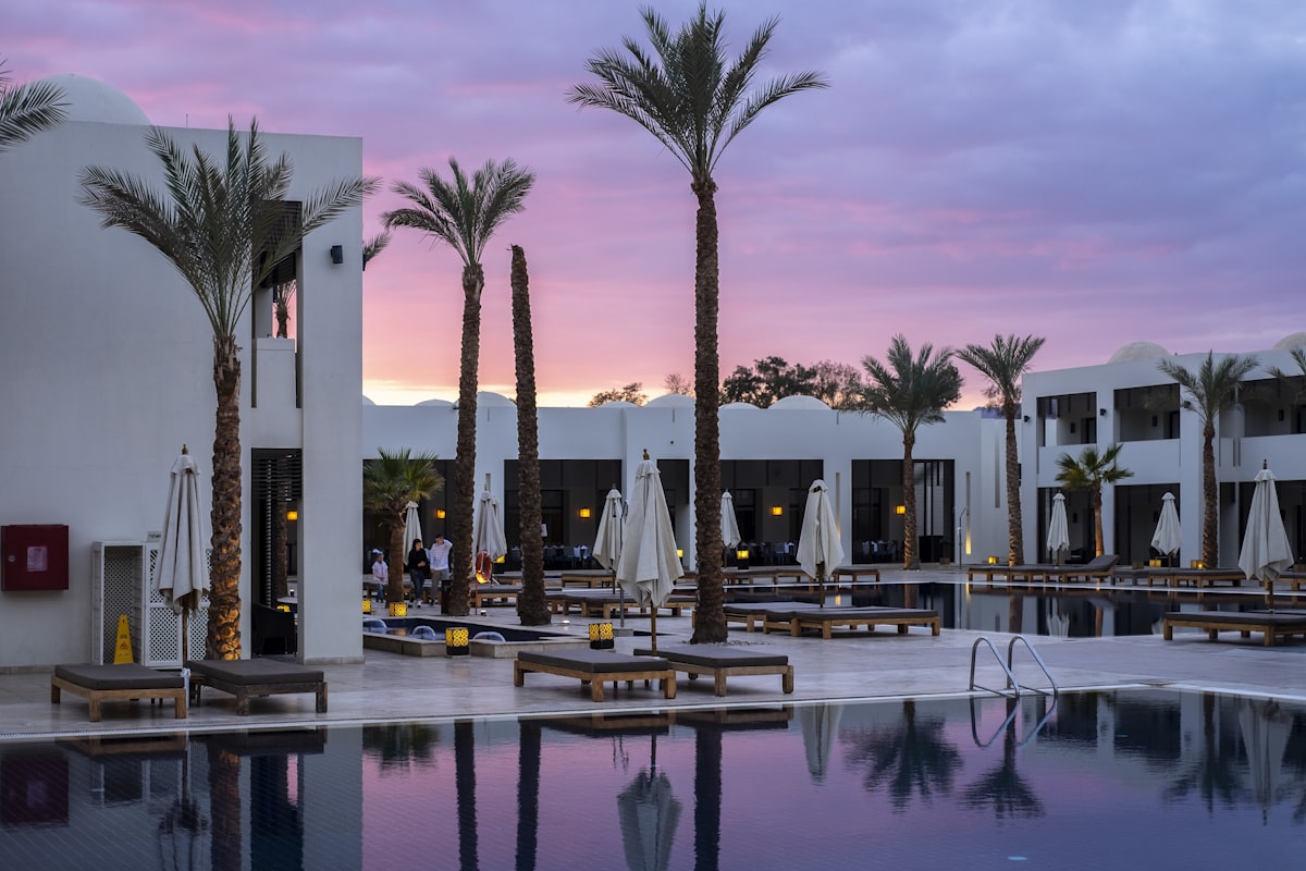 Resort pool courtyard at dusk
